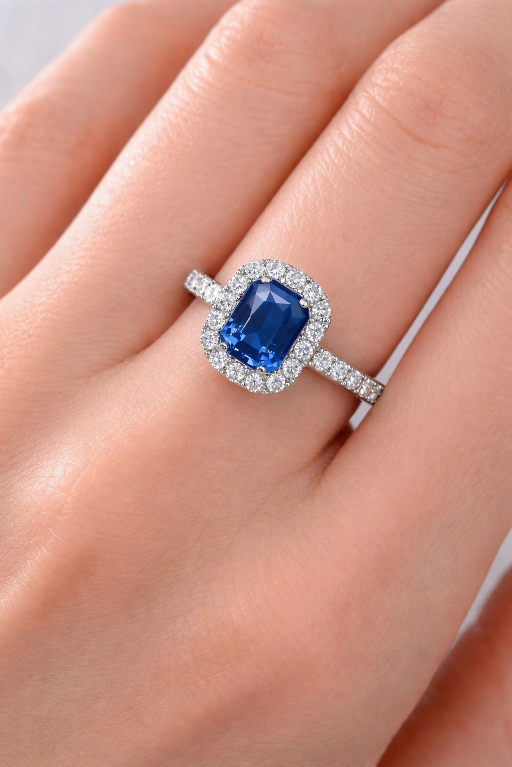 blue sapphire diamond halo gold ring