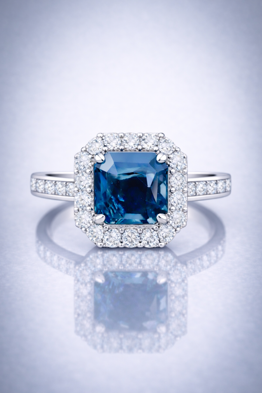 blue sapphire diamond halo white gold ring