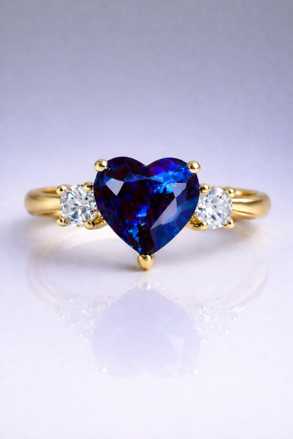 Eternal Heart blue sapphire three-stone ring in yellow gold