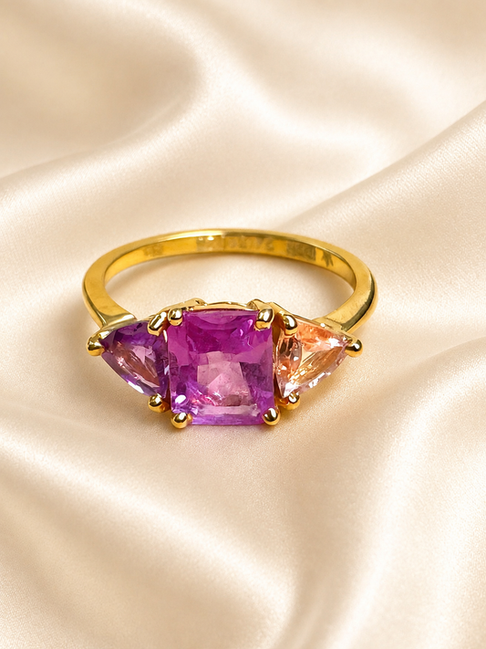 natural pink violet padparadscha sapphire trilogy yellow gold ring