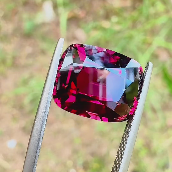 7.75 ct purplish pink rhodolite garnet certified