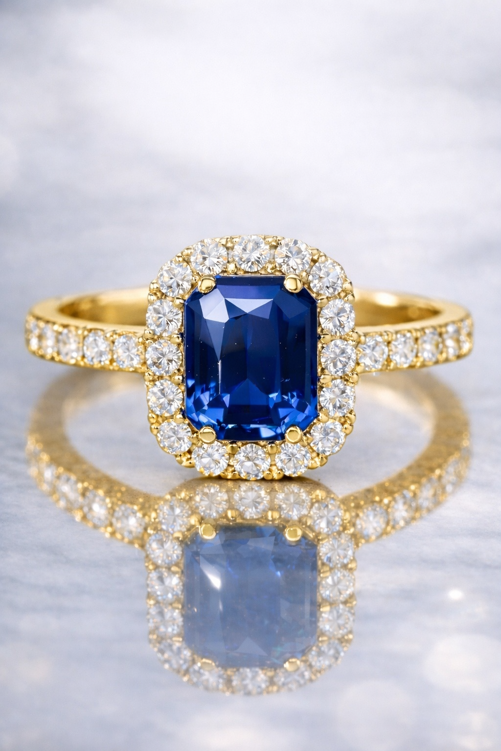 blue sapphire diamond halo yellow gold ring
